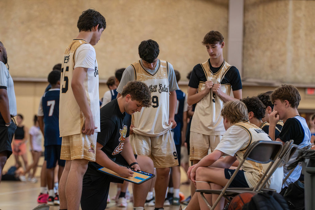 Coach Eli instructing players